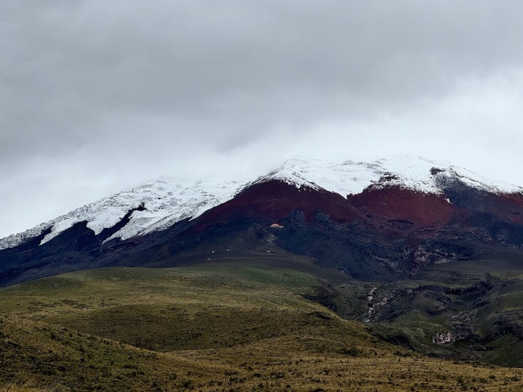 Snow-capped Cotopaxi volcano rising above the páramo grassland in the Ecuadorian highlands