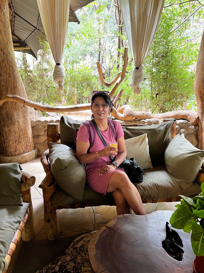 Milli Gupta, founder of Wesley Chapel Travel, relaxing in a safari camp lounge in Kenya
