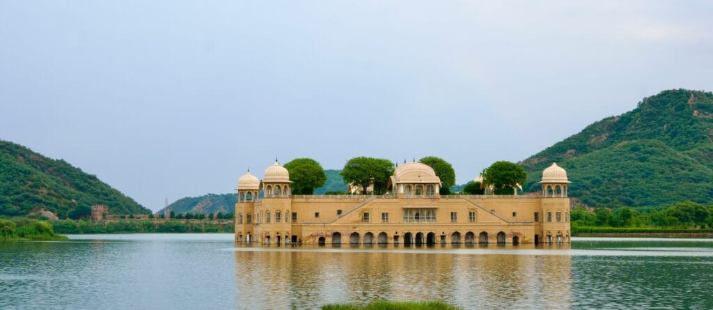 The Jal Mahal water palace adrift on Man Sagar Lake beneath the hills, Jaipur
