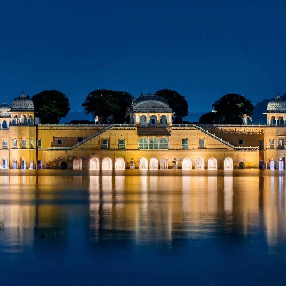 Jal Mahal glowing on the lake after dark, Jaipur