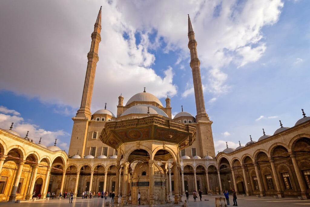 The domes, courtyard fountain and twin minarets of the Mosque of Mohamed Ali at the Cairo Citadel